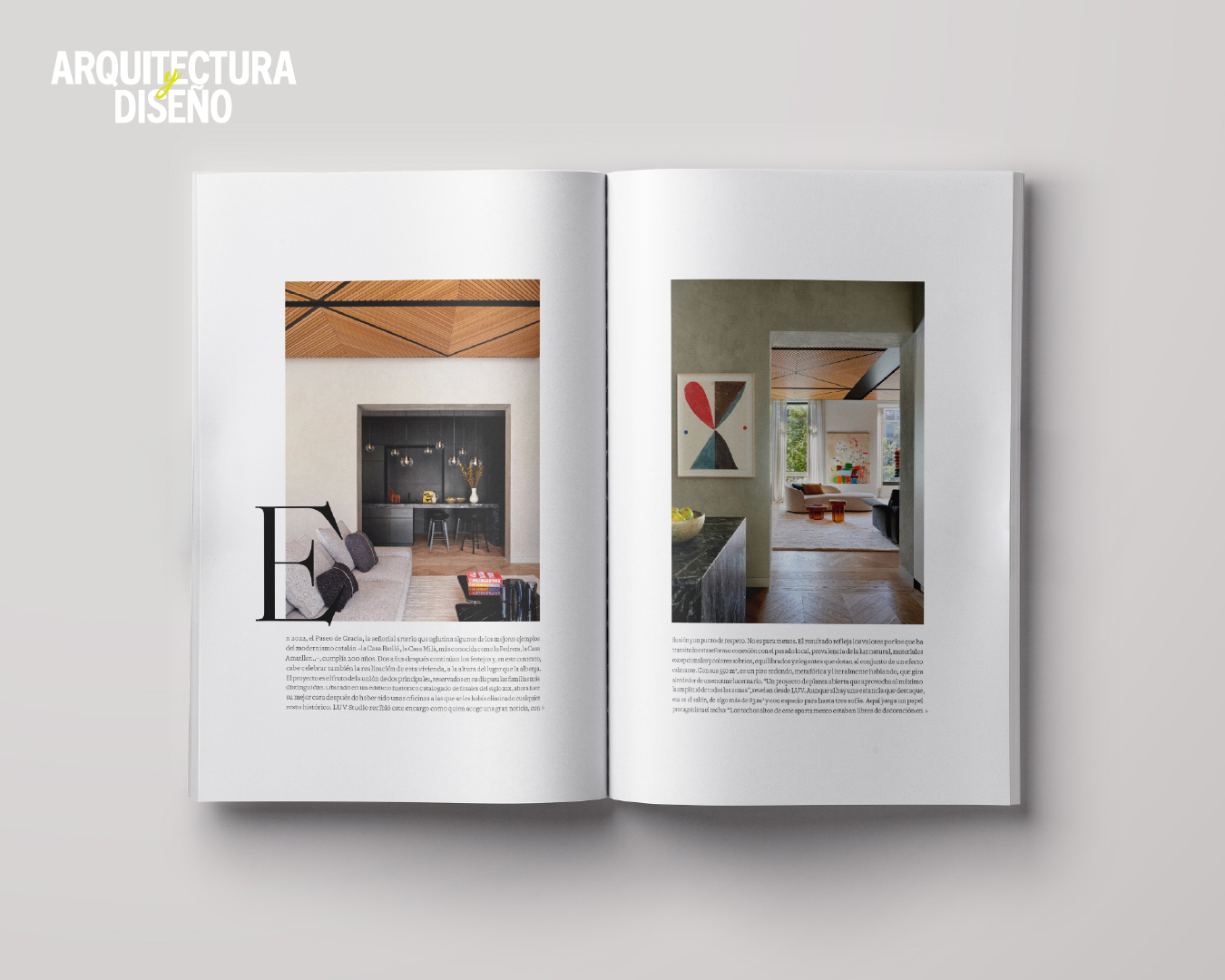 Elegant bedroom with soft textiles connected to an architectural corridor with natural light